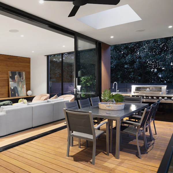 Open-plan living and dining area with a timber wall and skylight