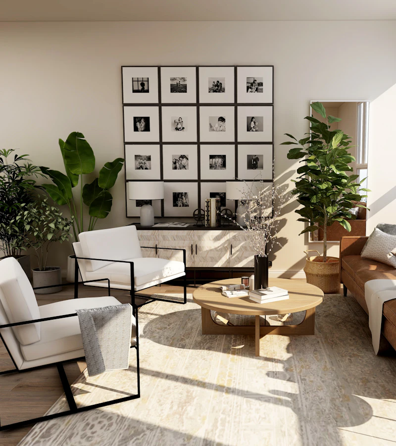 Family lounge with leather sofa, gallery wall of framed photographs and indoor plants